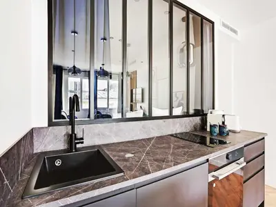 Cuisine ou kitchenette dans l'établissement Magnifique appartement -1BR 4P - Arc de Triomphe