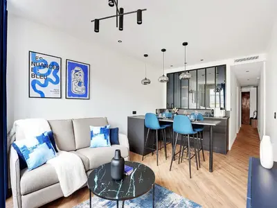 Coin salon dans l'établissement Magnifique appartement -1BR 4P - Arc de Triomphe