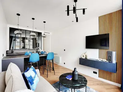 Télévision ou salle de divertissement dans l'établissement Magnifique appartement -1BR 4P - Arc de Triomphe
