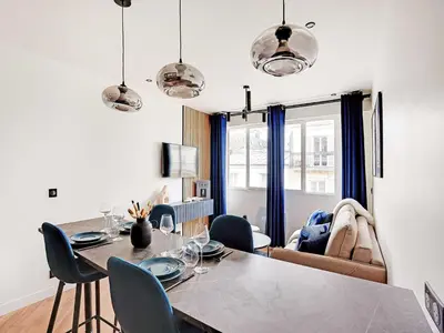 Coin salon dans l'établissement Magnifique appartement -1BR 4P - Arc de Triomphe