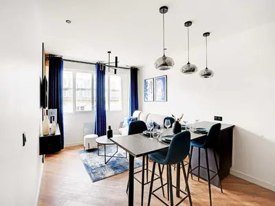 Coin salon dans l'établissement Magnifique appartement -1BR 4P - Arc de Triomphe