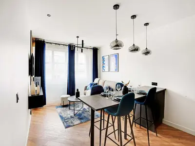 Coin salon dans l'établissement Magnifique appartement -1BR 4P - Arc de Triomphe