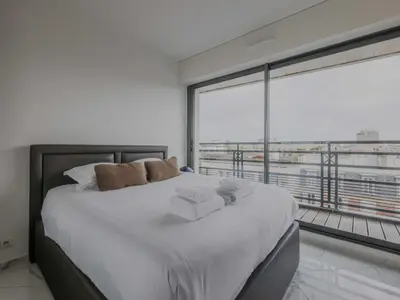 Un ou plusieurs lits dans un hébergement de l'établissement Modern Apt with Balcony - 1BD 4P- Levallois-Perret