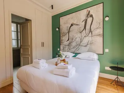 Un ou plusieurs lits dans un hébergement de l'établissement Charming apartment - 3BDR 6P - St Germain des Prés