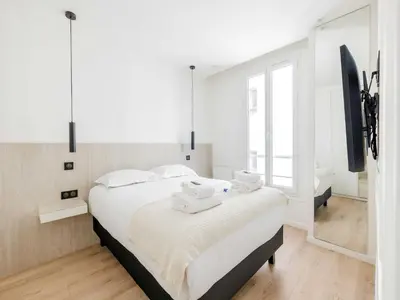 Un ou plusieurs lits dans un hébergement de l'établissement Charming apartment near Montmartre - Mobility lease