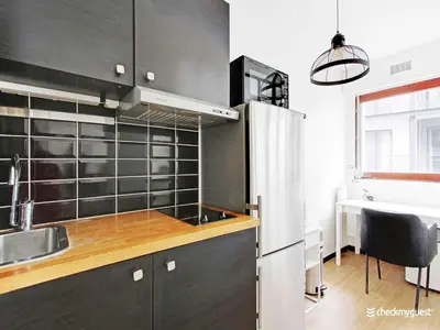 Cuisine ou kitchenette dans l'établissement Cosy Studio - 2P - Trocadéro Eiffel Tower