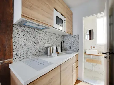 Cuisine ou kitchenette dans l'établissement Beautiful studio -16 ard de paris- Mobility lease