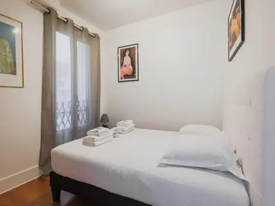 Un ou plusieurs lits dans un hébergement de l'établissement Comfortable flat - 1BD 4P - Gare Est