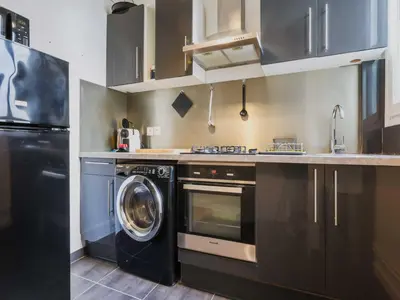 Cuisine ou kitchenette dans l'établissement Comfortable flat - 1BD 4P - Gare Est
