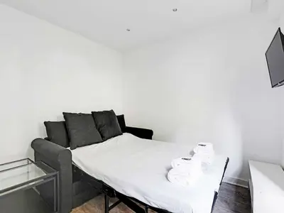 Un ou plusieurs lits dans un hébergement de l'établissement cosy studio 2p - buttes chaumont - bail mobilité
