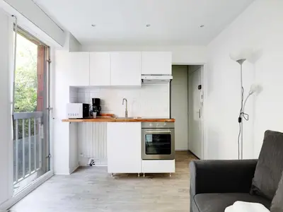 Cuisine ou kitchenette dans l'établissement cosy studio 2p - buttes chaumont - bail mobilité