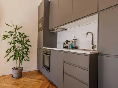 Cuisine ou kitchenette dans l'établissement COSY apartment -1BDR 4P -near Les Halles