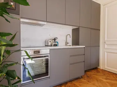 Cuisine ou kitchenette dans l'établissement COSY apartment -1BDR 4P -near Les Halles