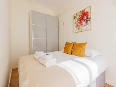 Un ou plusieurs lits dans un hébergement de l'établissement COSY apartment -1BDR 4P -near Les Halles
