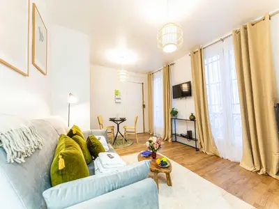 Télévision ou salle de divertissement dans l'établissement Cosy Studio 2P Quai de Jemmapes