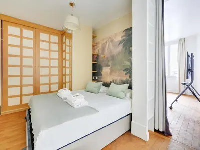 Un ou plusieurs lits dans un hébergement de l'établissement Peaceful Apt - 1BD 4P - Palais Royal Louvre