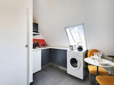 Cuisine ou kitchenette dans l'établissement Modern studio - Arc de Triomphe - MOBILITY LEASE