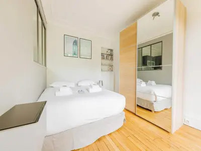 Un ou plusieurs lits dans un hébergement de l'établissement Charming apartment near DAUMESNIL - Mobility lease