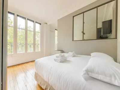 Un ou plusieurs lits dans un hébergement de l'établissement Charming apartment near DAUMESNIL - Mobility lease
