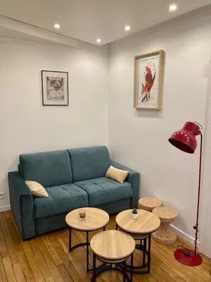 Coin salon dans l'établissement Appartement Paris 15