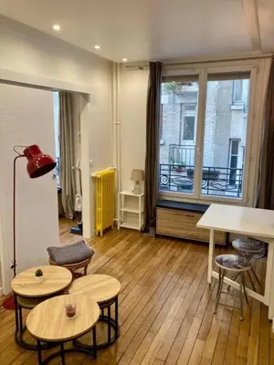 Coin salon dans l'établissement Appartement Paris 15