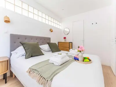 Un ou plusieurs lits dans un hébergement de l'établissement Apartment COSY- Boulogne - Mobility lease