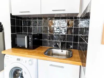 Cuisine ou kitchenette dans l'établissement Apartment COSY- Boulogne - Mobility lease