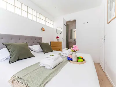 Un ou plusieurs lits dans un hébergement de l'établissement Apartment COSY- Boulogne - Mobility lease