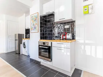 Cuisine ou kitchenette dans l'établissement Apartment COSY- Boulogne - Mobility lease