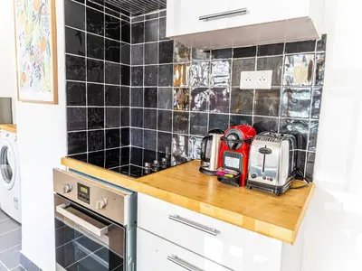 Cuisine ou kitchenette dans l'établissement Apartment COSY- Boulogne - Mobility lease