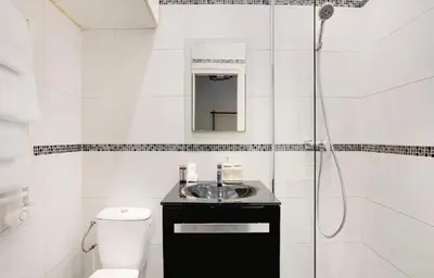 Salle de bains dans l'établissement Charmant studio au cœur de paris