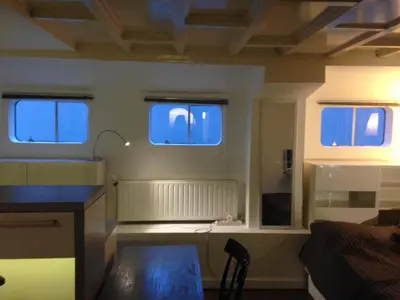 Coin salon dans l'établissement Charming Studio on House Boat