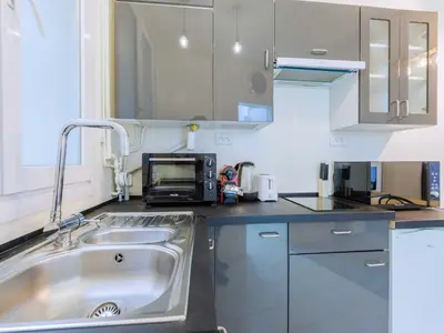 Cuisine ou kitchenette dans l'établissement Apartment near République - Mobility lease
