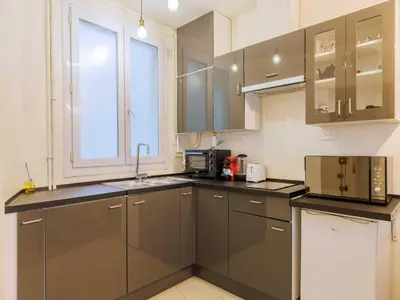 Cuisine ou kitchenette dans l'établissement Apartment near République - Mobility lease