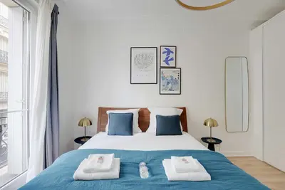 Un ou plusieurs lits dans un hébergement de l'établissement Modern apartment - 2BDR 6P - Paris 14e