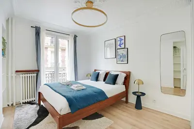 Un ou plusieurs lits dans un hébergement de l'établissement Modern apartment - 2BDR 6P - Paris 14e