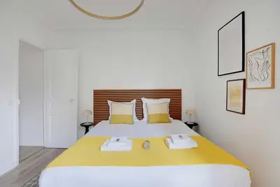 Un ou plusieurs lits dans un hébergement de l'établissement Modern apartment - 2BDR 6P - Paris 14e