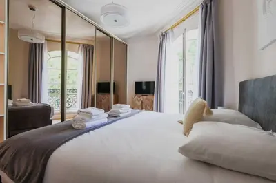 Un ou plusieurs lits dans un hébergement de l'établissement Beautiful Apt - 2BD 6P - Beaugrenelle