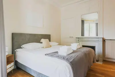 Un ou plusieurs lits dans un hébergement de l'établissement Beautiful Apt - 2BD 6P - Beaugrenelle