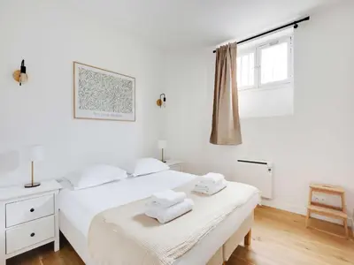 Un ou plusieurs lits dans un hébergement de l'établissement Sublime appt - 1BD 2P - Near Canal Saint Martin