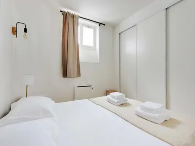 Un ou plusieurs lits dans un hébergement de l'établissement Sublime appt - 1BD 2P - Near Canal Saint Martin