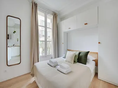 Un ou plusieurs lits dans un hébergement de l'établissement Charming flat - Rambuteau - Mobility lease
