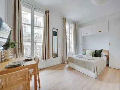 Un ou plusieurs lits dans un hébergement de l'établissement Charming flat - Rambuteau - Mobility lease