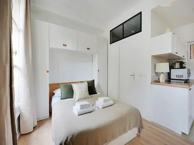 Un ou plusieurs lits dans un hébergement de l'établissement Charming flat - Rambuteau - Mobility lease