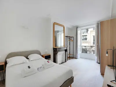 Un ou plusieurs lits dans un hébergement de l'établissement Superb apartment for 4 pers - Arc de Triomphe-Bail Mobility