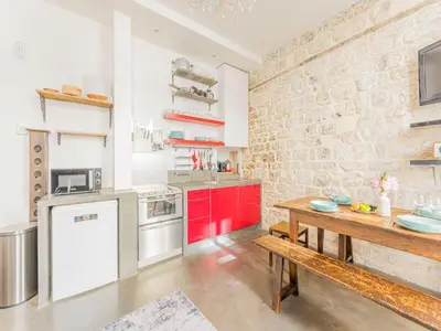 Cuisine ou kitchenette dans l'établissement Charming apartment - SENTIER - Mobility lease