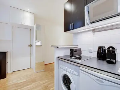 Cuisine ou kitchenette dans l'établissement Charming 2P studio - Bastille Charonne