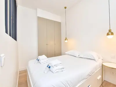 Un ou plusieurs lits dans un hébergement de l'établissement Luminous flat- 1 BDR 2P - Victor Hugo Arc de Triomphe