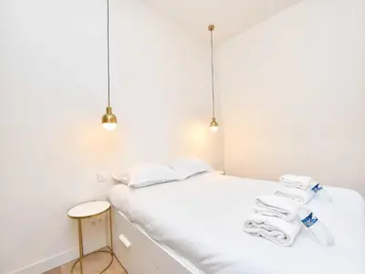 Un ou plusieurs lits dans un hébergement de l'établissement Luminous flat- 1 BDR 2P - Victor Hugo Arc de Triomphe