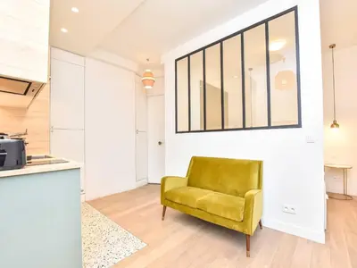 Coin salon dans l'établissement Luminous flat- 1 BDR 2P - Victor Hugo Arc de Triomphe
